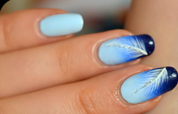 diseño de uñas decoradas plumas